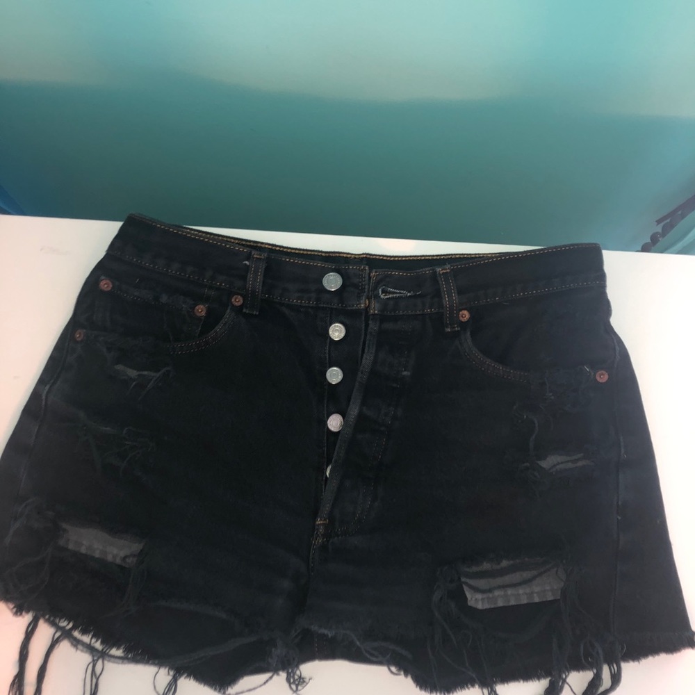 Levi’s 501 distressed black denim shorts